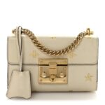 Grained Calfskin Bee Star Small Padlock Shoulder Bag White